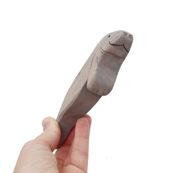 Wooden Manatee in hand - by Good Shepherd Toys