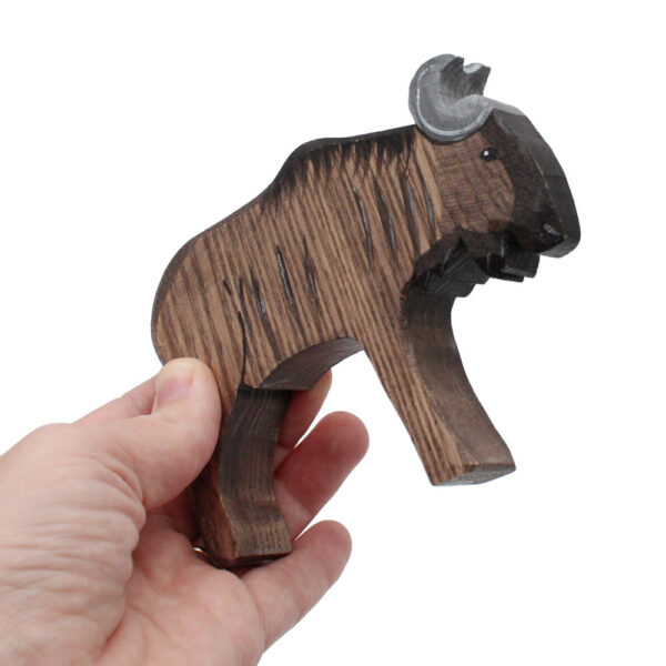 Wildebeest Wooden Figure in hand - by Good Shepherd Toys